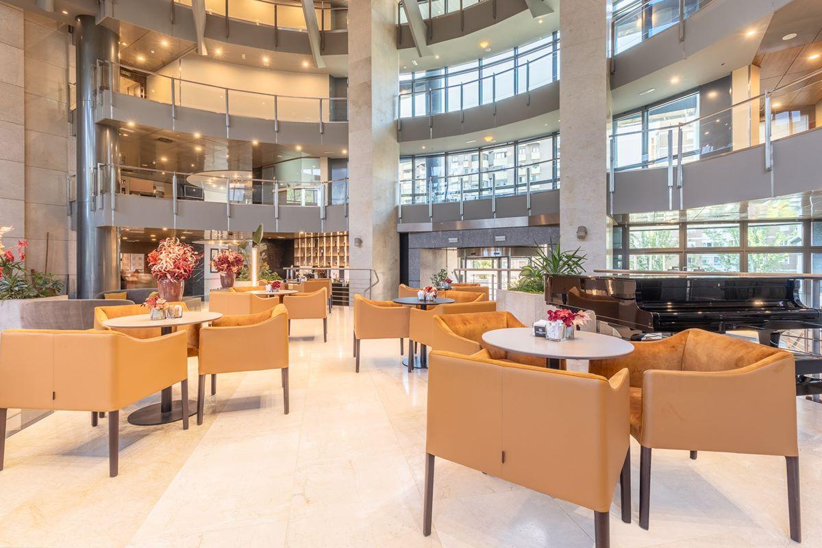 Eurostars Suites Mirasierra Мадрид Экстерьер фото The lounge at the airport