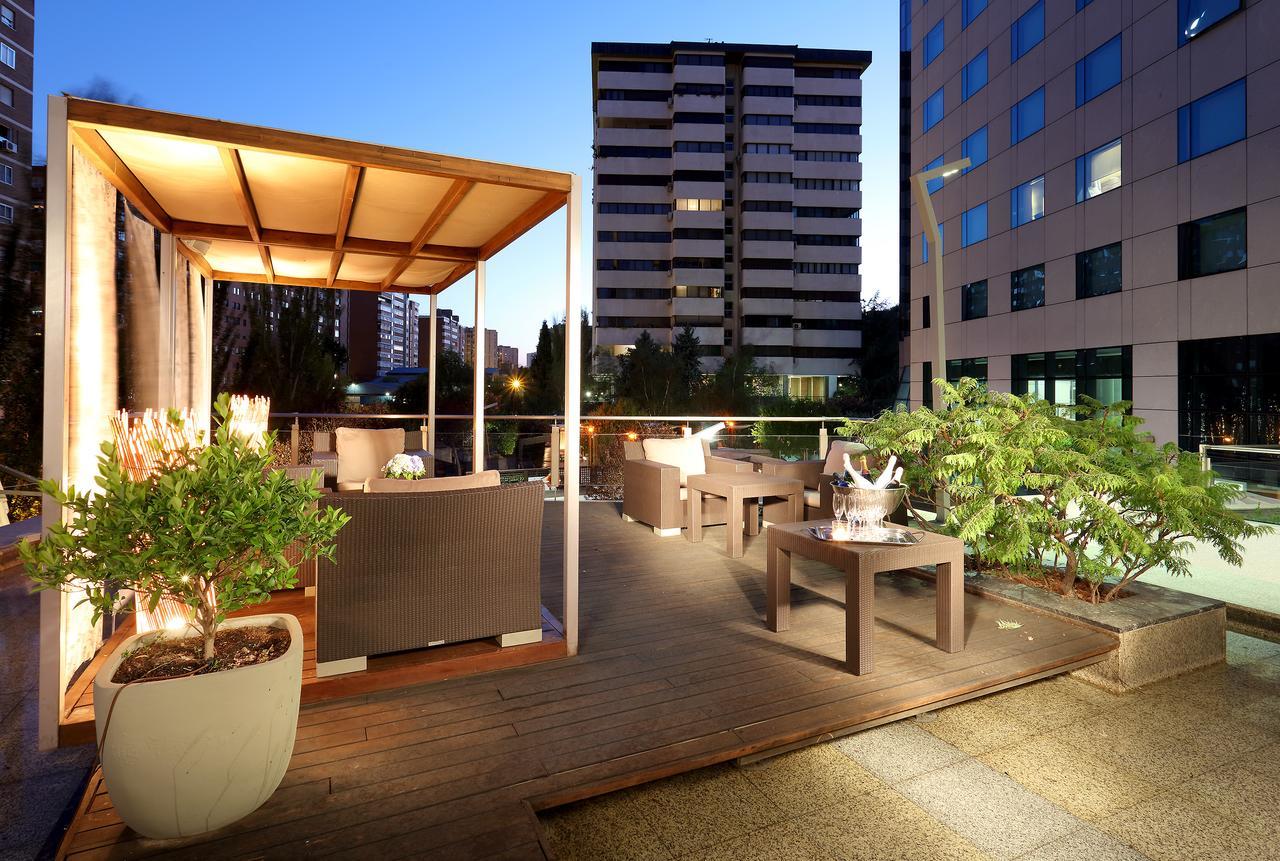 Eurostars Suites Mirasierra Мадрид Экстерьер фото The rooftop garden at the hotel